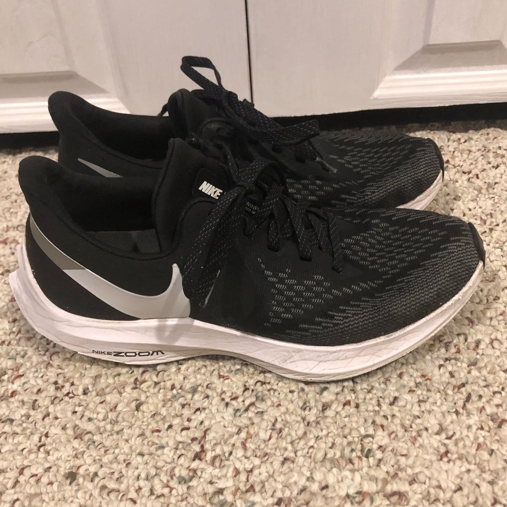 Nike women’s size 8.5 black and white shoes.